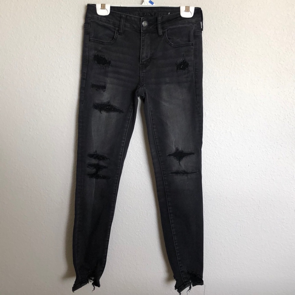 Destroyed black American eagle skinny jeans